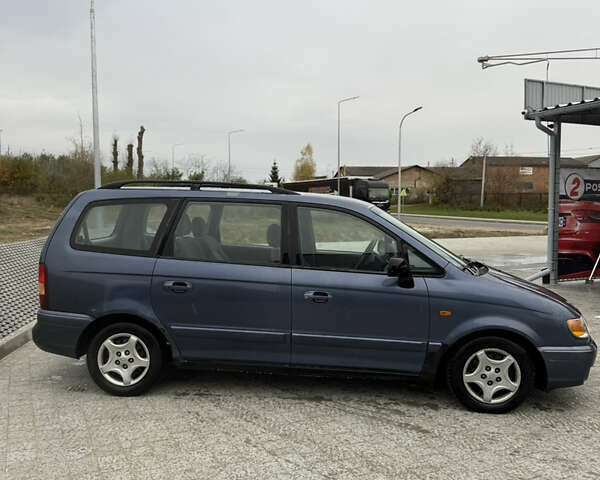 Синий Хендай Траджет, объемом двигателя 2 л и пробегом 300 тыс. км за 2100 $, фото 6 на Automoto.ua