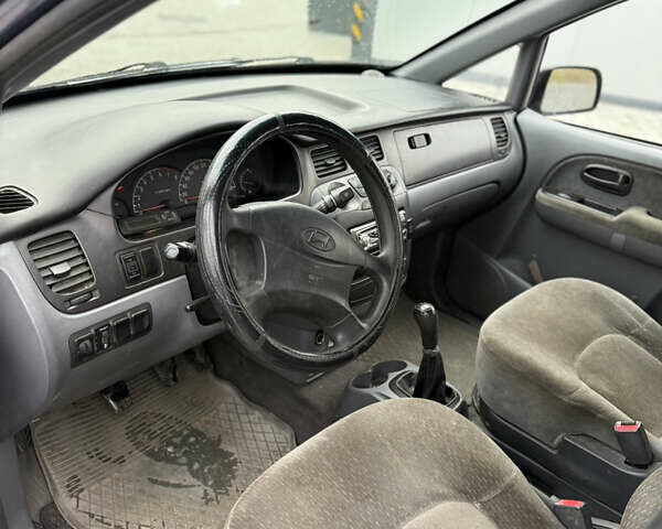 Синий Хендай Траджет, объемом двигателя 2 л и пробегом 300 тыс. км за 2100 $, фото 8 на Automoto.ua