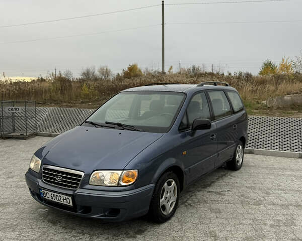 Синий Хендай Траджет, объемом двигателя 2 л и пробегом 300 тыс. км за 2100 $, фото 2 на Automoto.ua