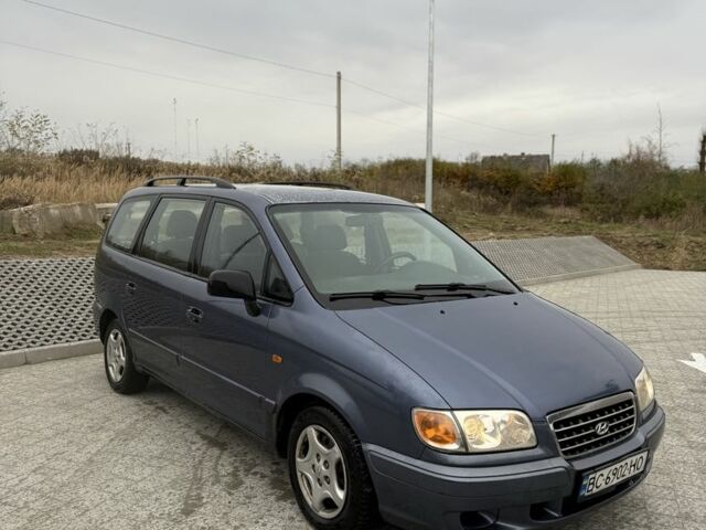 Синий Хендай Траджет, объемом двигателя 2 л и пробегом 300 тыс. км за 2100 $, фото 6 на Automoto.ua