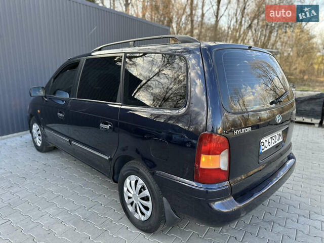 Синий Хендай Траджет, объемом двигателя 2 л и пробегом 180 тыс. км за 3750 $, фото 28 на Automoto.ua