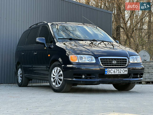 Синий Хендай Траджет, объемом двигателя 2 л и пробегом 180 тыс. км за 3750 $, фото 6 на Automoto.ua