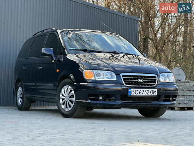 Синий Хендай Траджет, объемом двигателя 2 л и пробегом 180 тыс. км за 3750 $, фото 17 на Automoto.ua