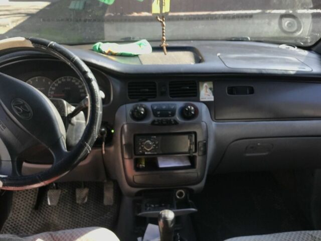 Синий Хендай Траджет, объемом двигателя 2 л и пробегом 340 тыс. км за 3200 $, фото 3 на Automoto.ua