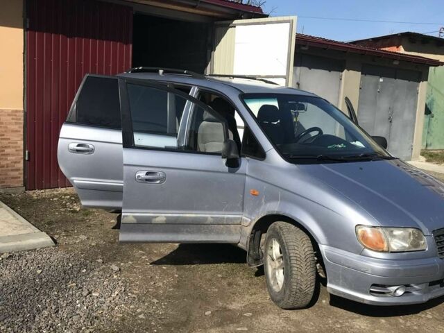 Синий Хендай Траджет, объемом двигателя 2 л и пробегом 340 тыс. км за 3200 $, фото 4 на Automoto.ua