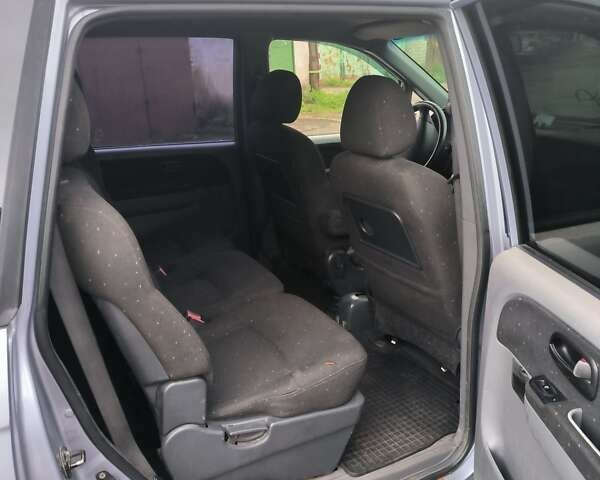 Синий Хендай Траджет, объемом двигателя 2 л и пробегом 300 тыс. км за 3900 $, фото 11 на Automoto.ua