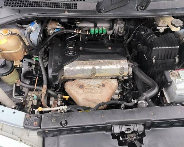 Синий Хендай Траджет, объемом двигателя 2 л и пробегом 300 тыс. км за 3900 $, фото 14 на Automoto.ua