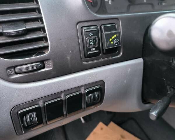 Синий Хендай Траджет, объемом двигателя 2 л и пробегом 300 тыс. км за 3900 $, фото 6 на Automoto.ua