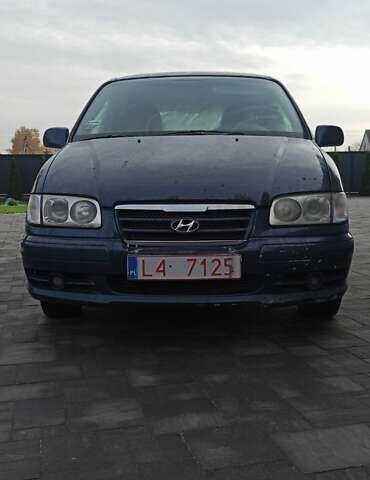 Синій Хендай Траджет, об'ємом двигуна 2 л та пробігом 390 тис. км за 2500 $, фото 3 на Automoto.ua