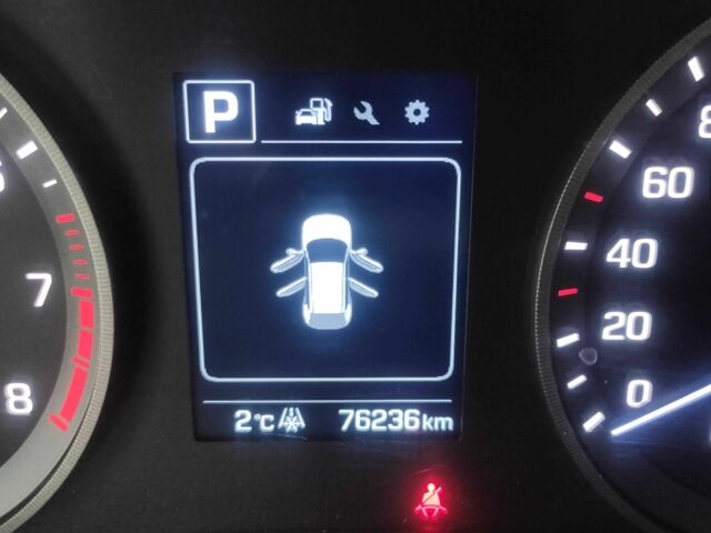 Белый Хендай Туксон, объемом двигателя 2 л и пробегом 76 тыс. км за 19300 $, фото 6 на Automoto.ua