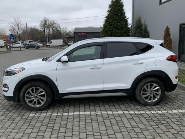 Білий Хендай Туксон, об'ємом двигуна 2 л та пробігом 150 тис. км за 14499 $, фото 3 на Automoto.ua