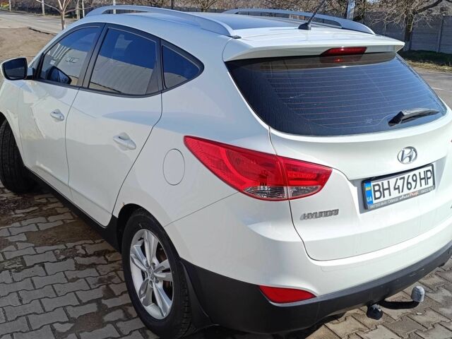 Білий Хендай Туксон, об'ємом двигуна 2 л та пробігом 120 тис. км за 11500 $, фото 8 на Automoto.ua