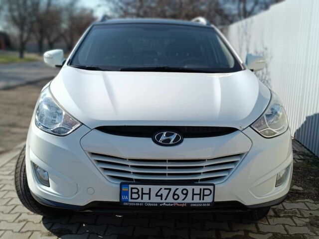 Білий Хендай Туксон, об'ємом двигуна 2 л та пробігом 120 тис. км за 11500 $, фото 13 на Automoto.ua