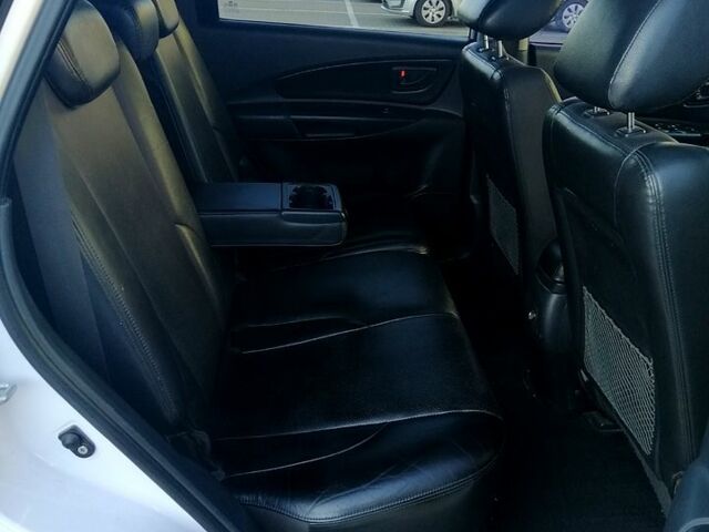 Білий Хендай Туксон, об'ємом двигуна 2 л та пробігом 228 тис. км за 7500 $, фото 5 на Automoto.ua