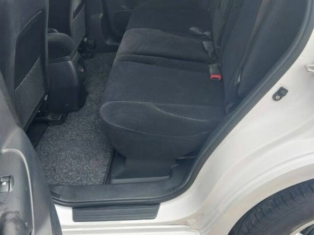 Белый Хендай Туксон, объемом двигателя 2 л и пробегом 120 тыс. км за 9600 $, фото 13 на Automoto.ua