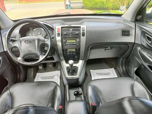 Белый Хендай Туксон, объемом двигателя 2 л и пробегом 192 тыс. км за 2227 $, фото 12 на Automoto.ua