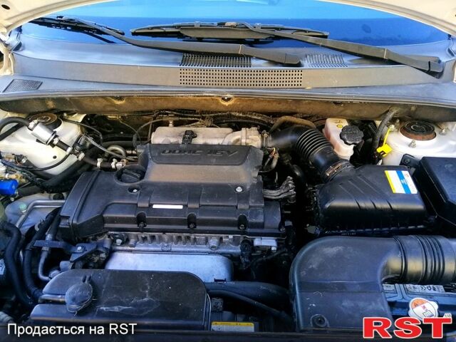 Білий Хендай Туксон, об'ємом двигуна 2 л та пробігом 228 тис. км за 7500 $, фото 1 на Automoto.ua