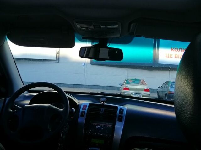 Білий Хендай Туксон, об'ємом двигуна 2 л та пробігом 228 тис. км за 7500 $, фото 2 на Automoto.ua