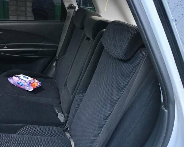 Белый Хендай Туксон, объемом двигателя 1.99 л и пробегом 191 тыс. км за 9300 $, фото 2 на Automoto.ua