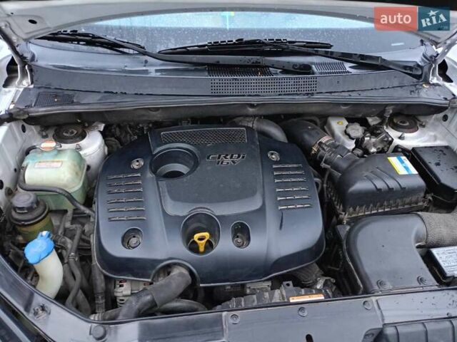 Белый Хендай Туксон, объемом двигателя 1.99 л и пробегом 191 тыс. км за 9300 $, фото 11 на Automoto.ua