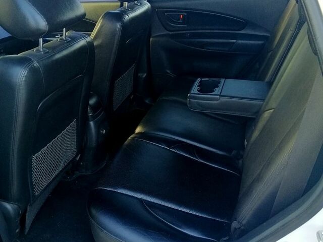 Білий Хендай Туксон, об'ємом двигуна 2 л та пробігом 228 тис. км за 7500 $, фото 4 на Automoto.ua