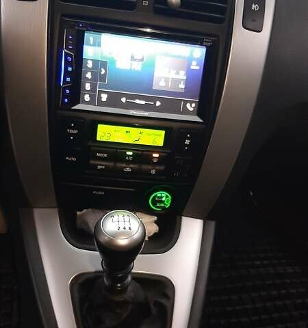 Белый Хендай Туксон, объемом двигателя 1.99 л и пробегом 191 тыс. км за 9300 $, фото 27 на Automoto.ua