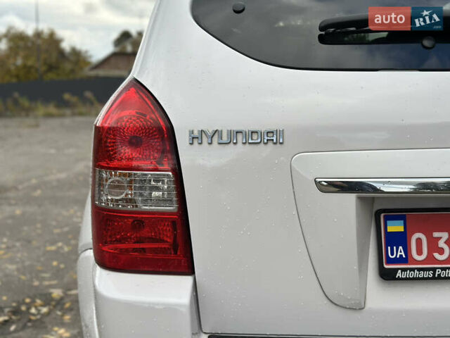 Белый Хендай Туксон, объемом двигателя 2 л и пробегом 221 тыс. км за 7700 $, фото 10 на Automoto.ua