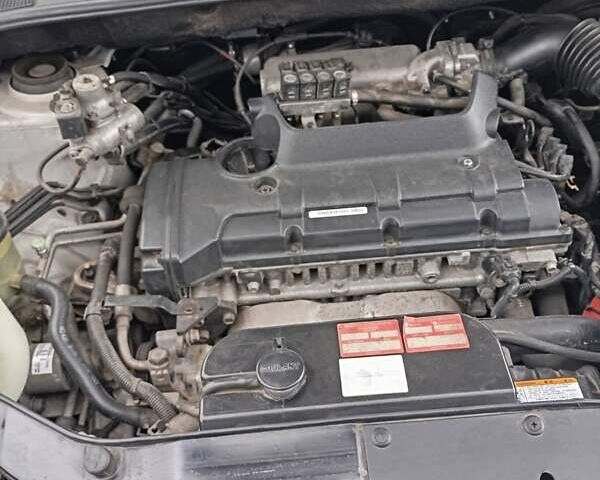 Белый Хендай Туксон, объемом двигателя 1.98 л и пробегом 200 тыс. км за 8500 $, фото 12 на Automoto.ua