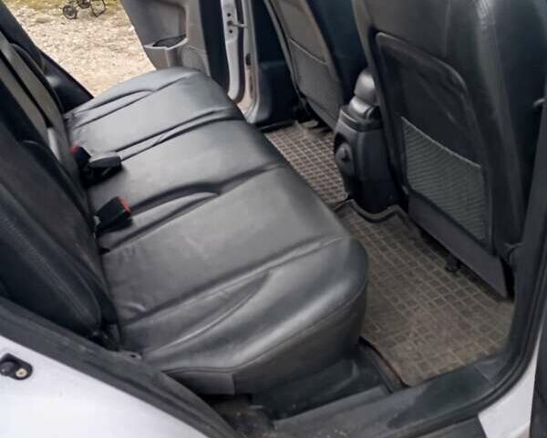 Белый Хендай Туксон, объемом двигателя 1.98 л и пробегом 200 тыс. км за 8500 $, фото 10 на Automoto.ua