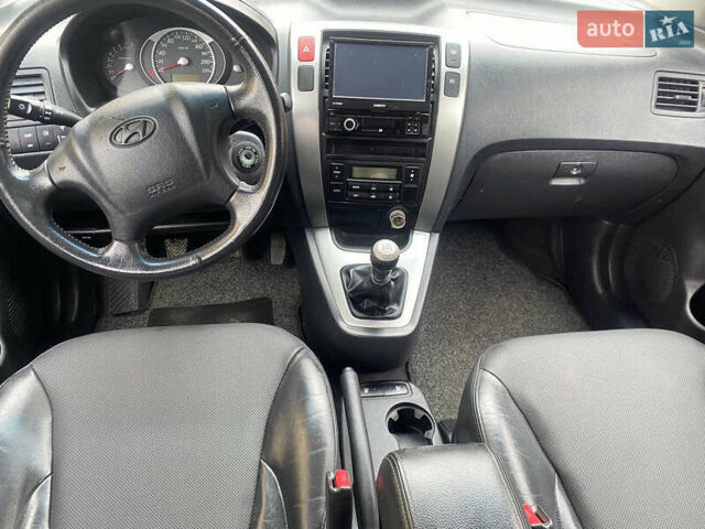 Білий Хендай Туксон, об'ємом двигуна 2 л та пробігом 210 тис. км за 7890 $, фото 7 на Automoto.ua