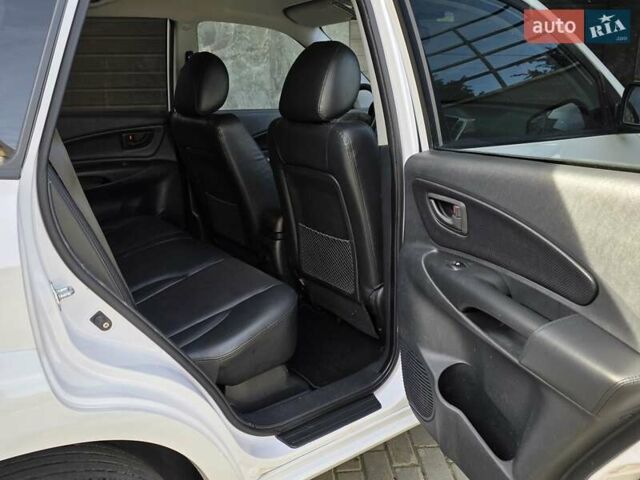 Хендай Туксон 2009 в Тернополе на Automoto.ua Белый Хендай Туксон, объемом двигателя 2 л и пробегом 212 тыс. км за 7350 $, фото 30 на Automoto.ua