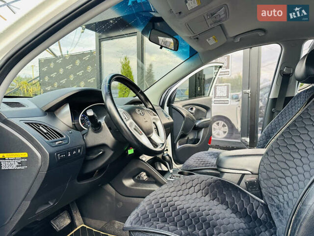 Хендай Туксон 2010 в Харькове на Automoto.ua Белый Хендай Туксон, объемом двигателя 2.36 л и пробегом 163 тыс. км за 11900 $, фото 12 на Automoto.ua
