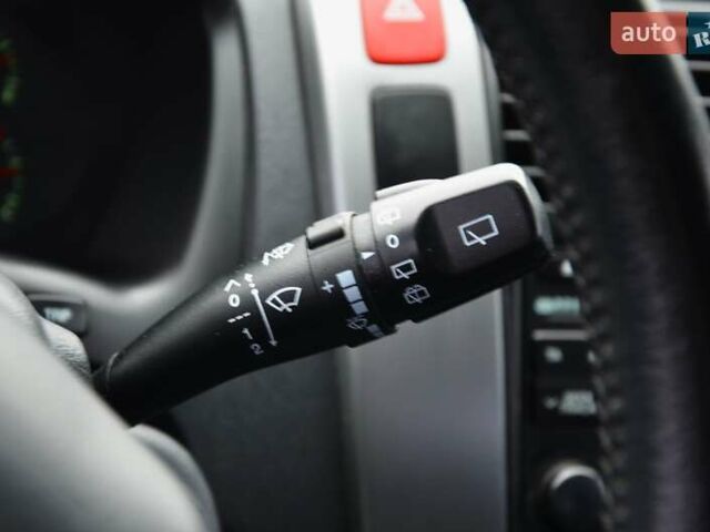 Білий Хендай Туксон, об'ємом двигуна 1.98 л та пробігом 186 тис. км за 8777 $, фото 24 на Automoto.ua