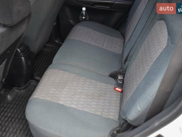 Білий Хендай Туксон, об'ємом двигуна 1.98 л та пробігом 186 тис. км за 8777 $, фото 26 на Automoto.ua