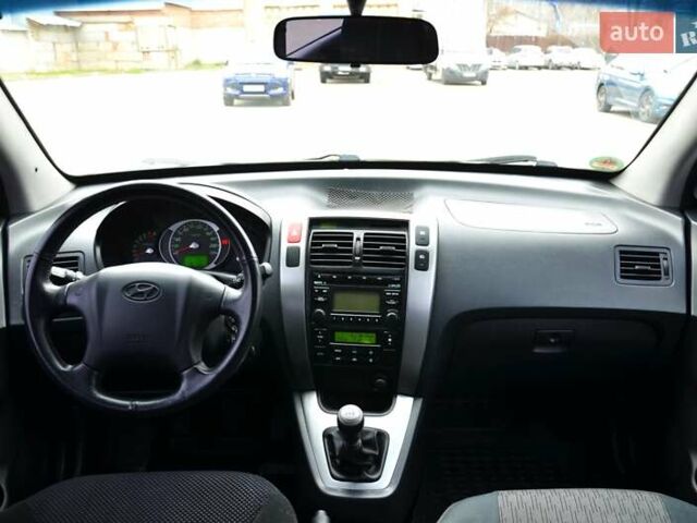 Білий Хендай Туксон, об'ємом двигуна 1.98 л та пробігом 186 тис. км за 8777 $, фото 27 на Automoto.ua