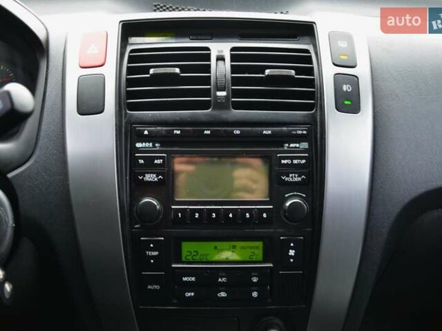 Білий Хендай Туксон, об'ємом двигуна 1.98 л та пробігом 186 тис. км за 8777 $, фото 22 на Automoto.ua