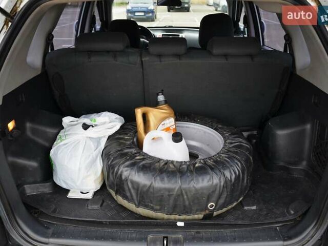 Білий Хендай Туксон, об'ємом двигуна 1.98 л та пробігом 186 тис. км за 8777 $, фото 31 на Automoto.ua