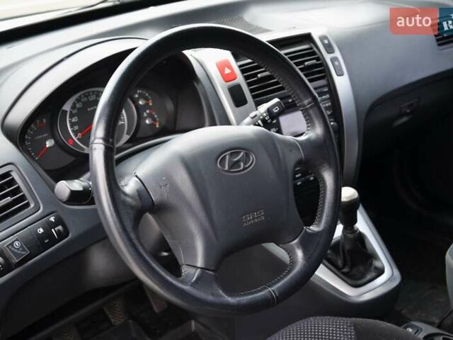 Білий Хендай Туксон, об'ємом двигуна 1.98 л та пробігом 186 тис. км за 8777 $, фото 18 на Automoto.ua