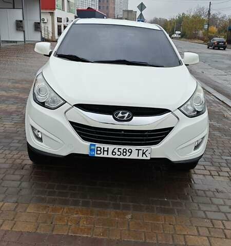 Білий Хендай Туксон, об'ємом двигуна 2 л та пробігом 220 тис. км за 12500 $, фото 1 на Automoto.ua