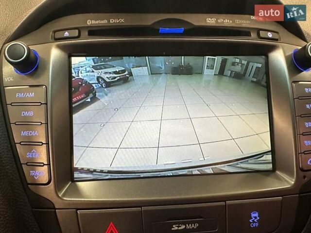 Белый Хендай Туксон, объемом двигателя 2 л и пробегом 150 тыс. км за 14500 $, фото 14 на Automoto.ua