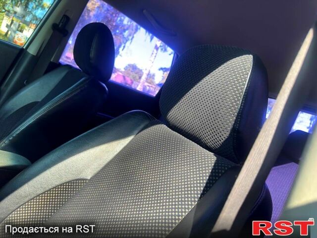 Белый Хендай Туксон, объемом двигателя 2 л и пробегом 142 тыс. км за 10280 $, фото 5 на Automoto.ua
