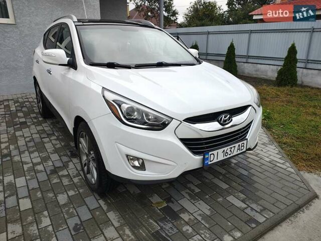 Білий Хендай Туксон, об'ємом двигуна 2.36 л та пробігом 152 тис. км за 9800 $, фото 5 на Automoto.ua
