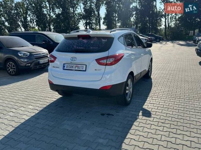 Белый Хендай Туксон, объемом двигателя 2 л и пробегом 156 тыс. км за 16400 $, фото 5 на Automoto.ua