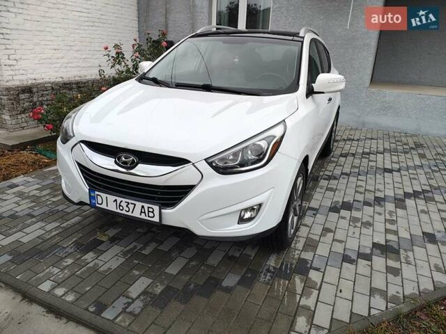 Білий Хендай Туксон, об'ємом двигуна 2.36 л та пробігом 152 тис. км за 9800 $, фото 7 на Automoto.ua