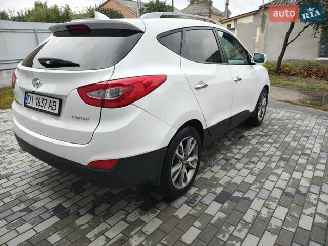Білий Хендай Туксон, об'ємом двигуна 2.36 л та пробігом 152 тис. км за 9800 $, фото 3 на Automoto.ua