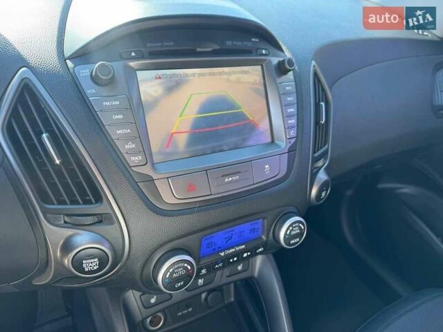 Белый Хендай Туксон, объемом двигателя 2 л и пробегом 156 тыс. км за 16400 $, фото 10 на Automoto.ua