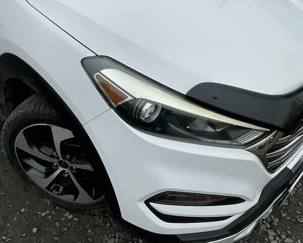 Белый Хендай Туксон, объемом двигателя 1.59 л и пробегом 156 тыс. км за 16000 $, фото 8 на Automoto.ua