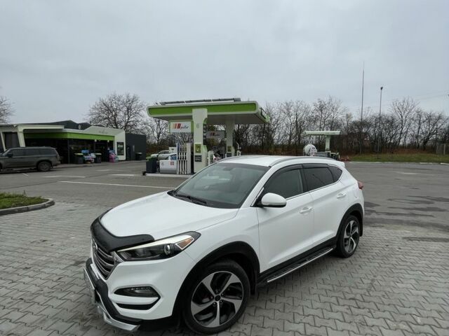 Белый Хендай Туксон, объемом двигателя 1.6 л и пробегом 156 тыс. км за 16000 $, фото 7 на Automoto.ua