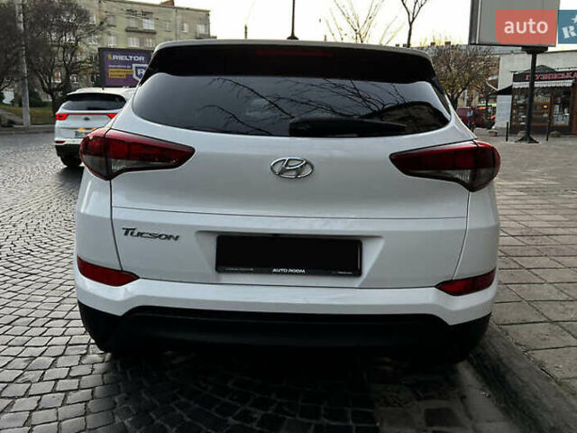 Белый Хендай Туксон, объемом двигателя 2 л и пробегом 99 тыс. км за 12600 $, фото 8 на Automoto.ua
