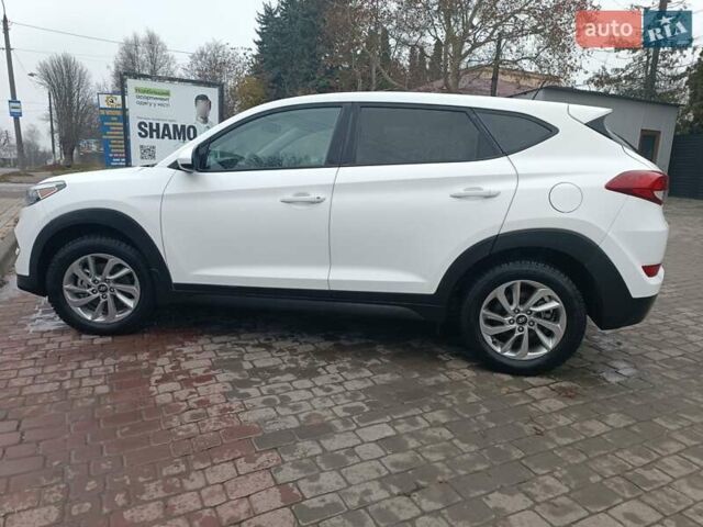 Білий Хендай Туксон, об'ємом двигуна 2 л та пробігом 97 тис. км за 14200 $, фото 5 на Automoto.ua